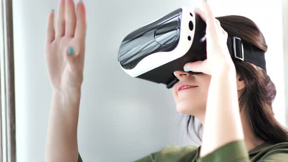 Closeup Head of Smiling Young European Woman Wearing Hitech Virtual Reality Glasses