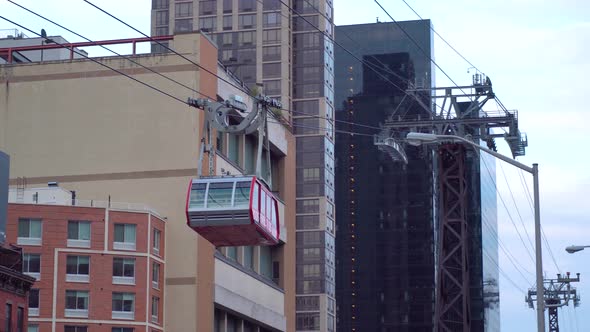 NEW YORK - 01 26, 2019: of the Roosevelt Island Tramway and Queensboro Bridge road ligation with car