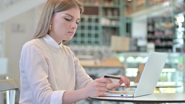 Young Woman with Online Payment Failure on Laptop