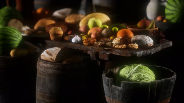 Food Table with Wine Barrels and Some Fruits, Vegetables and Bread