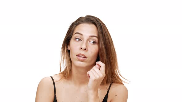 Young Beautiful Girl Thinking Considering Over White Background