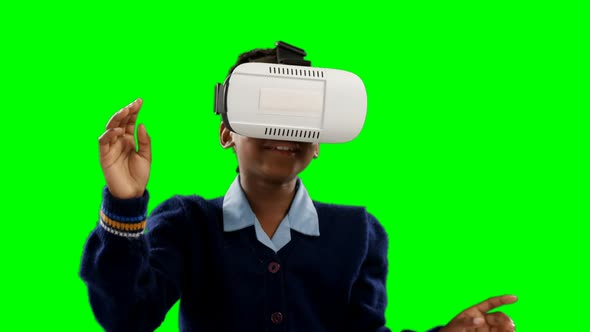 Schoolgirl using virtual reality headset 4k