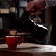 Cinematic Slow Motion Pouring Coffee in Red Cup from Black Mokapot - VideoHive Item for Sale