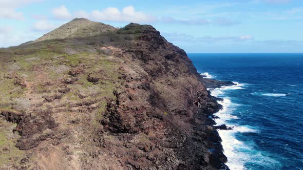 Flying in above hawaiian sea cliff and the makapuu lighthouse hike