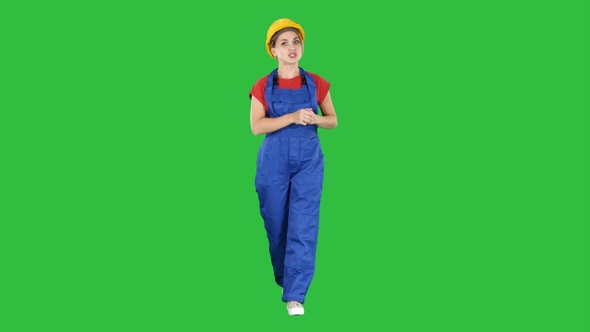 A woman construction worker talking to camera in confident