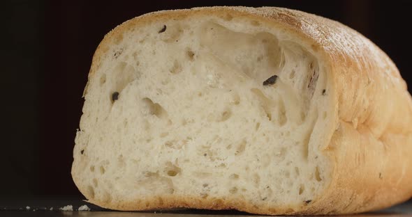 Cut Off The Crispy Crust Of Fresh Bread