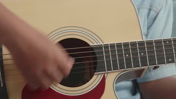 Close Up Hand Boy Playing Guitar