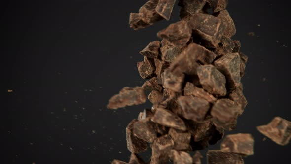 Super Slow Motion Shot of Raw Chocolate Chunks Side Crashing at 1000 Fps