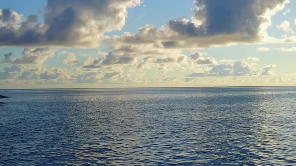 Summer seascape of sea view beach trip by sea and sand background after sunrise