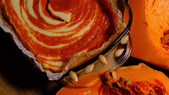 Pumpkin pudding with cottage cheese in glass form with sliced pumpkin seeds. Baked pumpkin, mousse