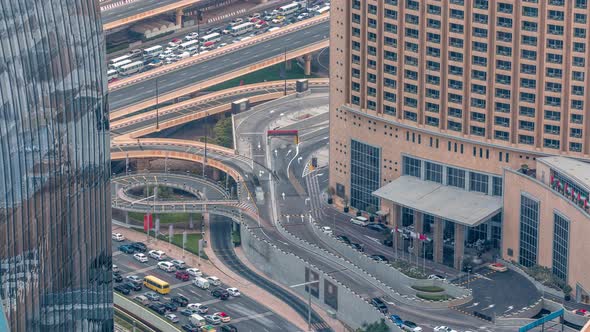 Dubai Downtown Street with Busy Traffic and Skyscrapers Around Timelapse