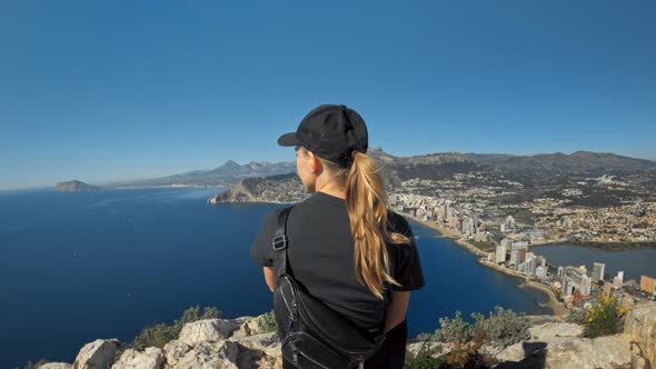 Young Fit Woman on Hike or Trail Run Mountain Peak