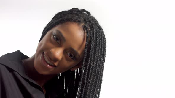 Mixed Race Woman with Hair Braids in Studio on White Closeup Portrait