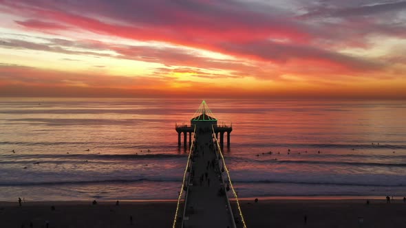 Manhattan Beach Pier Against Dramatic Sunset Horizon In California, United States. Wide Shot