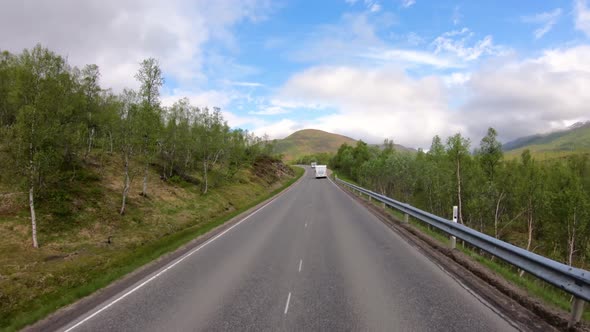 Vehicle Point-of-view Driving a Car VR Caravan Travels on the Highway