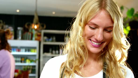 Portrait of smiling waitress