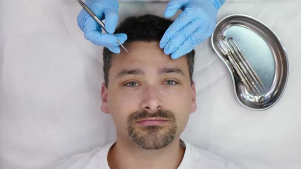 Beautician Uses Cosmetic Spoon