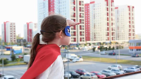 Superhero Kid Against Urban Background