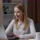 Communication on distance via video, video call. Young attractive woman using app on laptop - VideoHive Item for Sale
