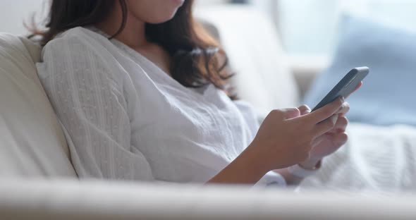 Young woman use of smart phone at home