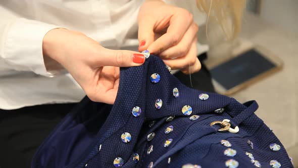 sewing on rhinestones