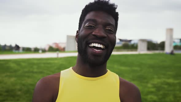 Happy African gay man celebrating pride festival - LGBTQ community concept