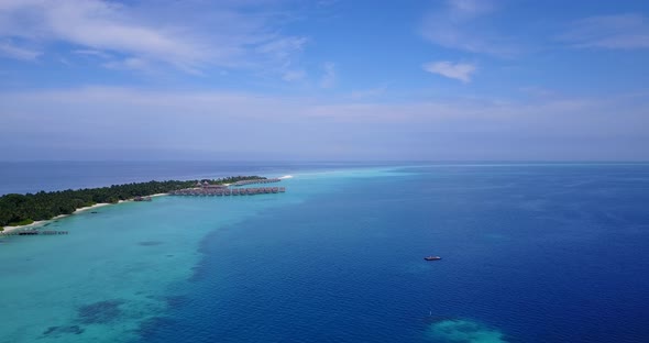 Maldives Blue Ocean Showing A Wide Open Body Of Water Under A Bright Blue Sky Surrounding The Island