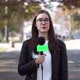 Girl Journalist Is Reporting on the Street - VideoHive Item for Sale