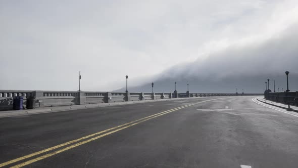 Illuminated Empty Road Bridge in a Fog