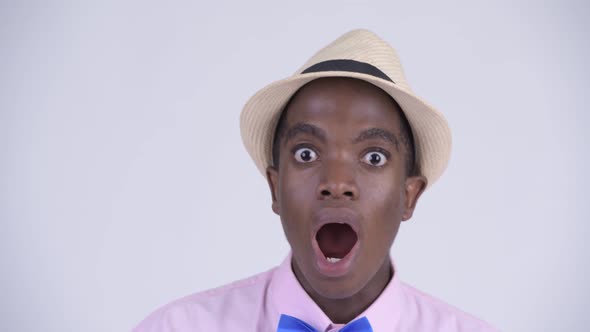 Face of Young Happy African Tourist Man Looking Surprised