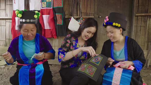 Hmong Ethnic Women Sewing Traditional Costume