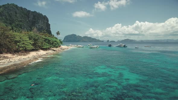 Cruise Passenger Boats with Tourists at Coast of Tropical Resort on Tour of Philippine Archipelago