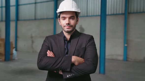 Portrait Confident Factory Manager Wearing Suit and Safety Helmet