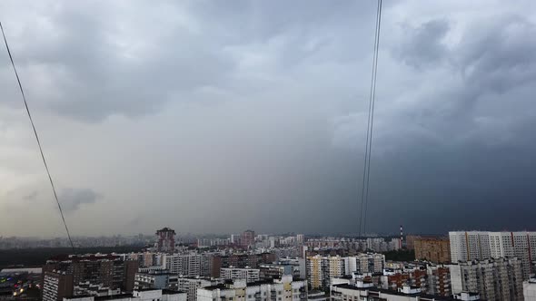 Heavy Thunderstorm Over a Big City. Stormy Front Goes Into the Distance. Weather Cataclysm, Rainy