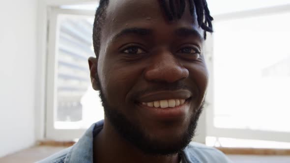 Portrait of a man at home smiling