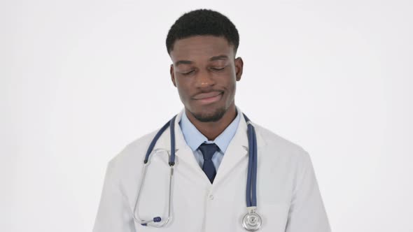 African Doctor Showing No Sign By Shaking Head on White Background