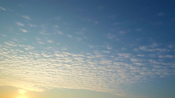 4K : Time lapse of colorful sky during beautiful sunset.  Romantic clouds.