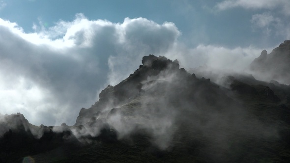 Environment. Iceland. Geyser in famous tourist attraction. Steam from fumarole in geothermal area.