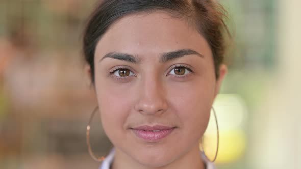 Close Up of Face of Serious Young Indian Woman 