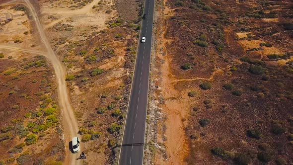 Top View of Cars Ride Along a Desert Road on Tenerife Canary Islands Spain
