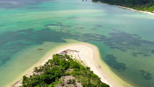 Tropical Island with a Lagoon and White Sandy Beach