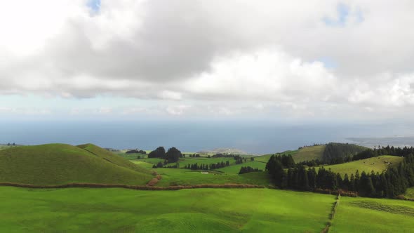 Agriculture fields, rural landscape with Atlantic Ocean in background, Azores