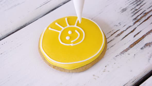 Decoration of Cookie with Smiling Sun Image