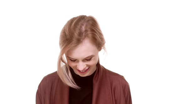 Beautiful Young Caucasian Teenager Girl Standing on White Background Laughing Smiling Looking at