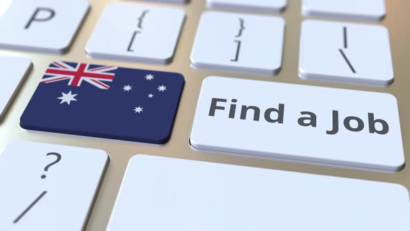 FIND A JOB Text and Flag of Australia on Computer Keyboard