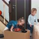 Surprised children near box with puppy - VideoHive Item for Sale