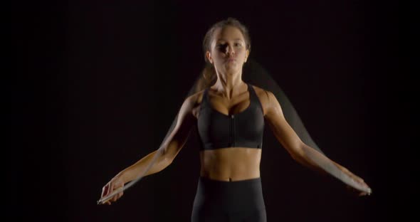 Slow Motion Woman Jumping Rope
