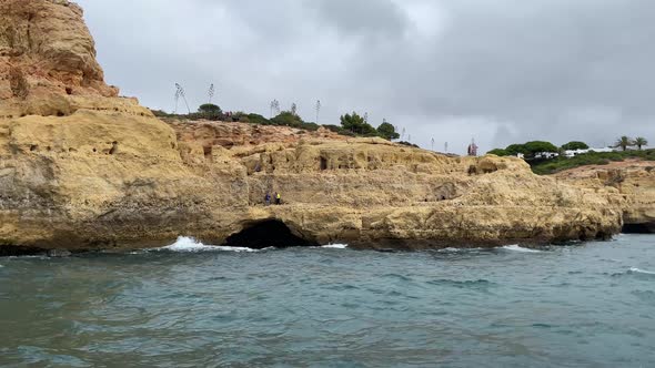 Unique coastal geological formations in Portugal. View from boat at sea