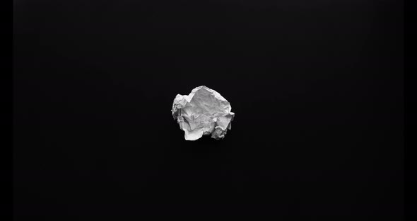 Paper crumple stop motion. alt