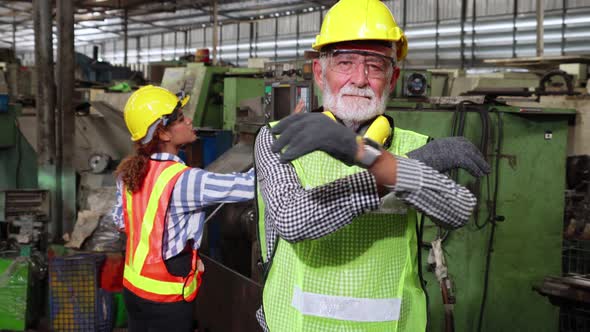 Senior Factory Worker or Engineer Close Up Portrait in Factory